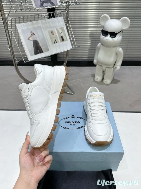 2025 Women Prada White Cow Leather Lambskin Sneakers KFY00310