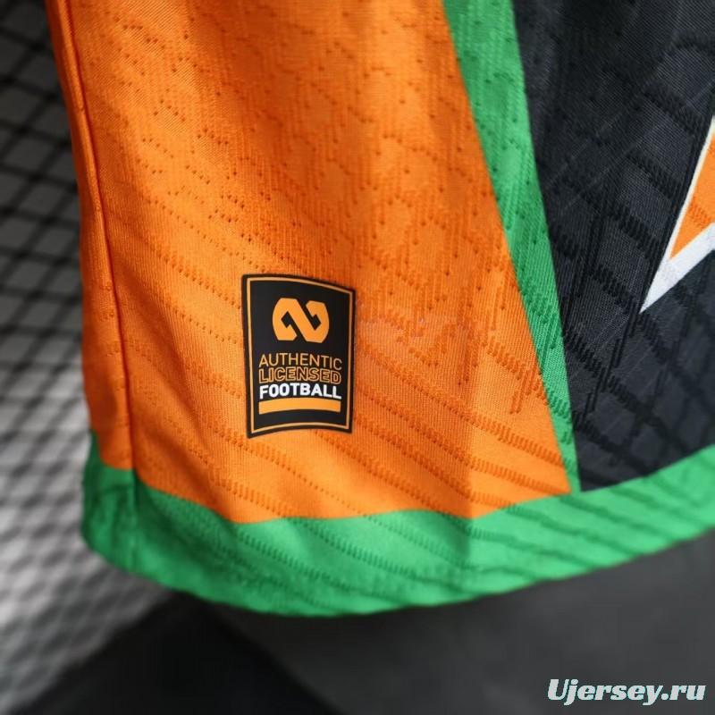 Player Version 2025 Ivory Coast Black with Elephant Graphic and Orange Stripes Jersey